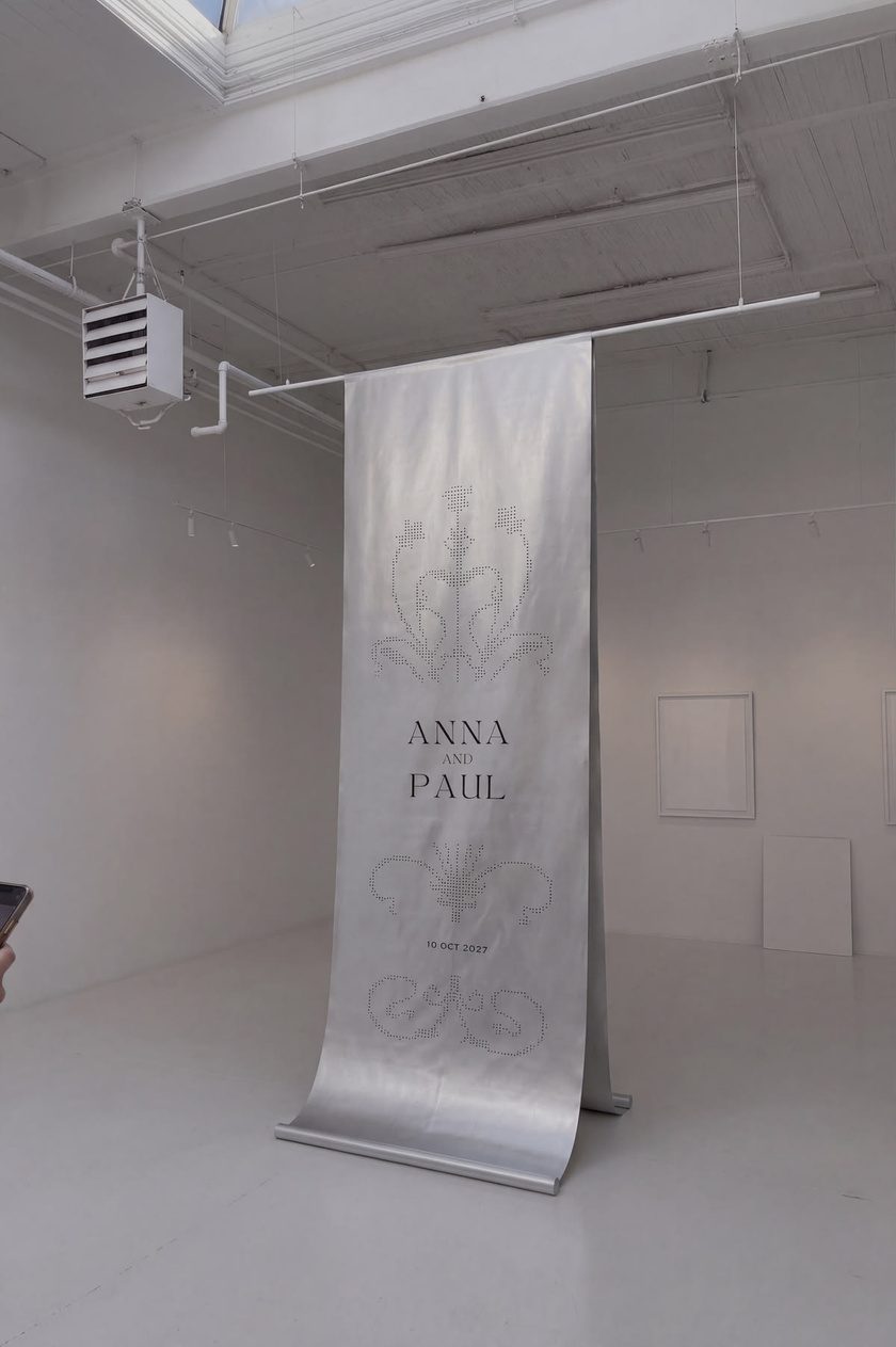 Large-format printed satin banner suspended in a white gallery, luxury print installation by UTWÖ Studio