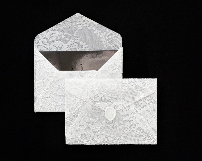 Luxury lace wedding envelopes with wax seal, fashion-forward invitation by UTWÖ Studio